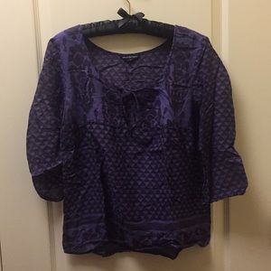 See through brown and purple blouse